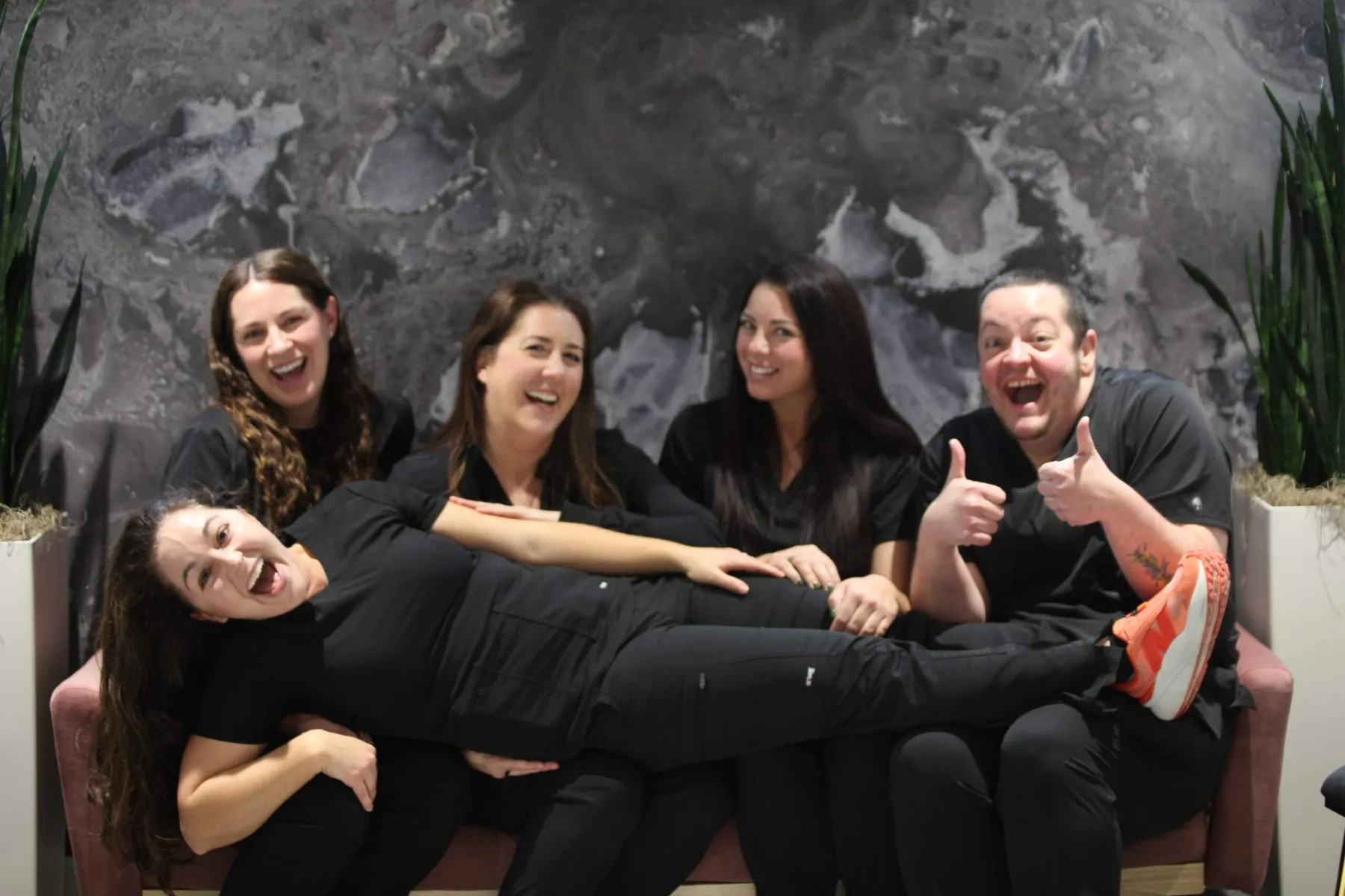 Our Westport dental team sharing a lighthearted moment together